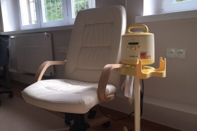 armchair and breast pump